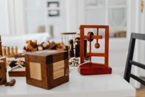 pexels-photo-7296663-7296663 Wooden puzzles on a table showcasing a minimalist indoor setting.