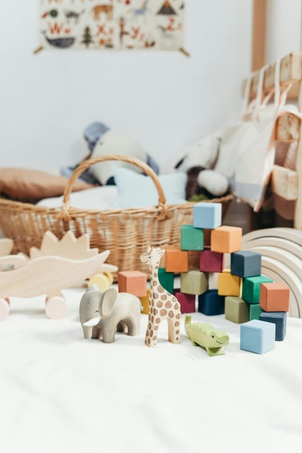 Cozy bedroom featuring a collection of colorful wooden toys and wicker basket, perfect for family fun.